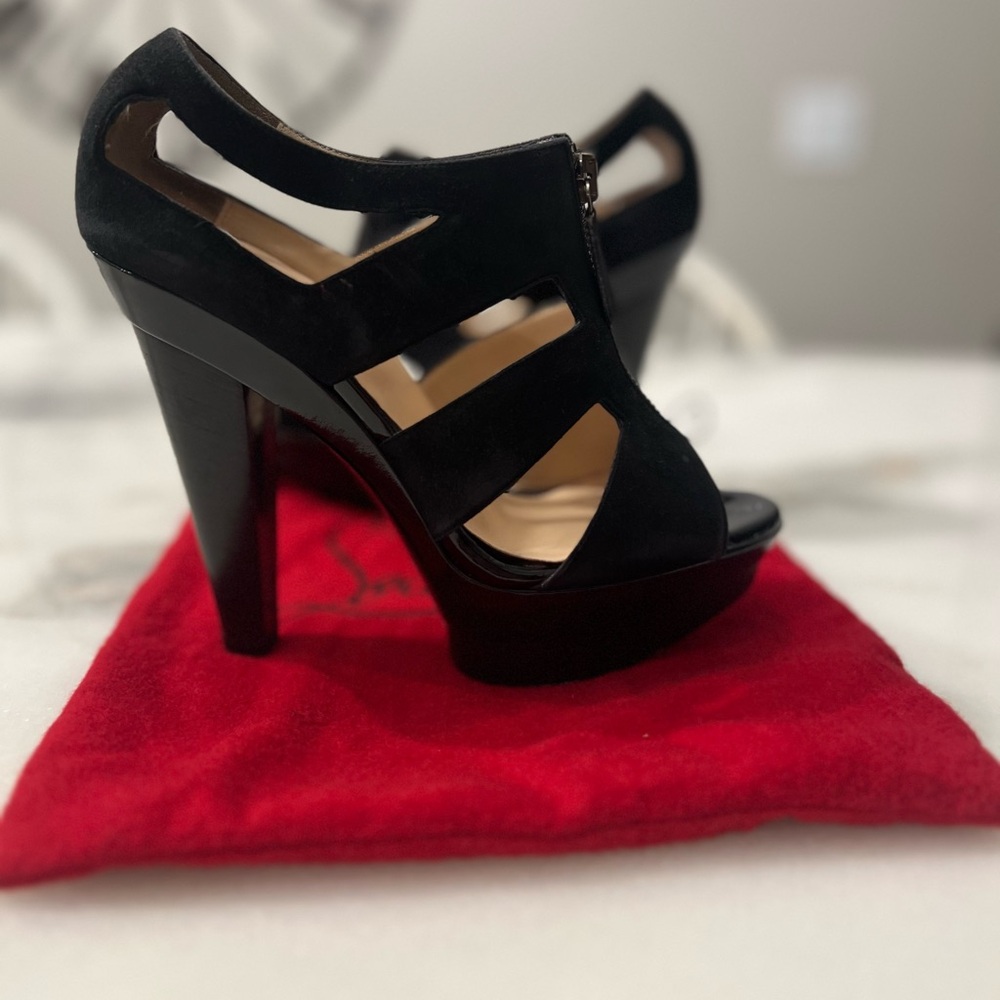 Gently used Christian Louboutin Platform Sandals. Size 37.5. Fit a US size 6.